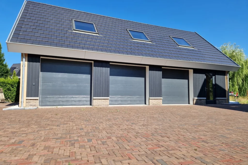 Garage doors installed in Emmeloord, Damm Deurntechiek, EMI Group